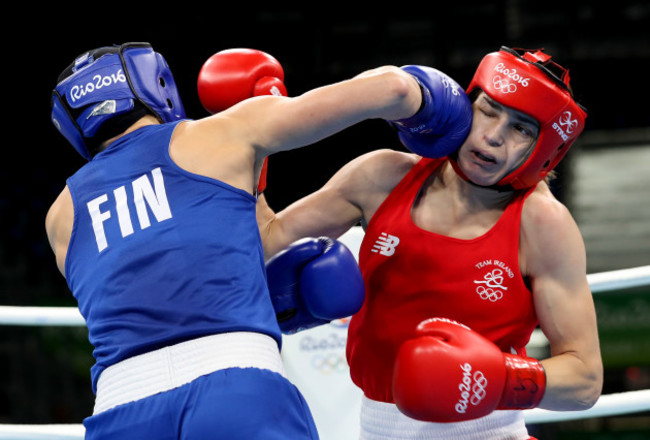 Katie Taylor with Mira Potkonen