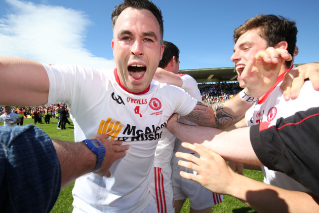 Cathal McCarron celebrates with team mates at the final whistle