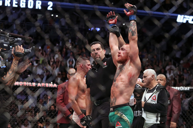 Conor McGregor is declared the winner by split decision