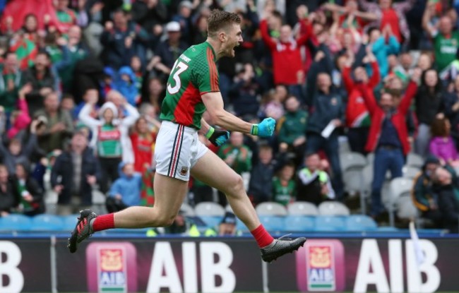 Conor O'Shea celebrates after scoring a goal