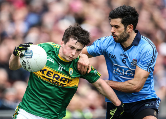 Cian O'Sullivan tackles Paul Murphy