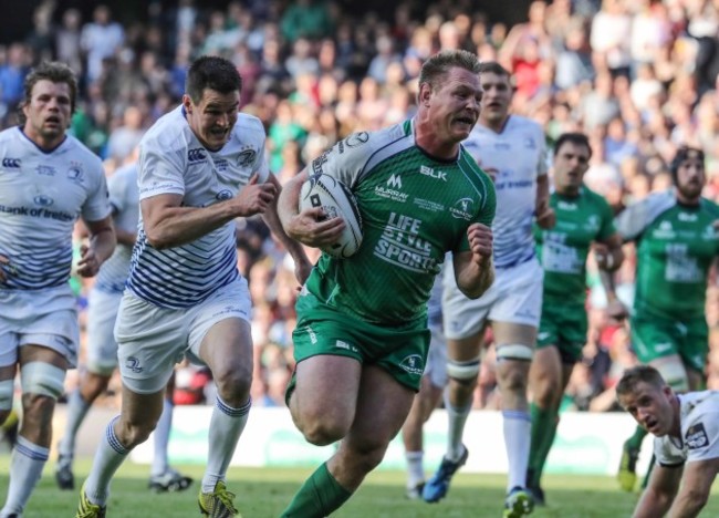 Connacht’s Tom McCartney chased by Leinster’s Jonathan Sexton