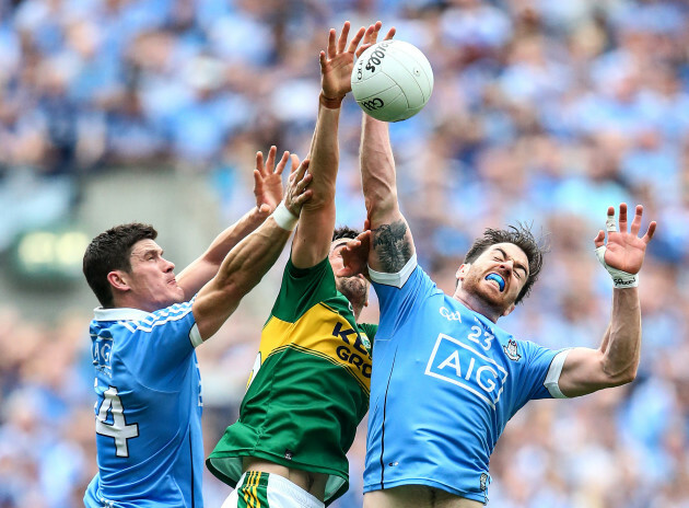 Diarmuid Connolly and Michael Darragh MacAuley with Anthony Maher