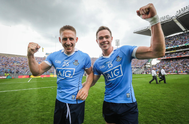 Eoghan O’Gara and Dean Rock celebrate after the game
