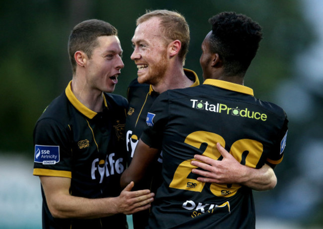 Chris Shields celebrates his goal with Shane Grimes and Carlton Ubaezuono