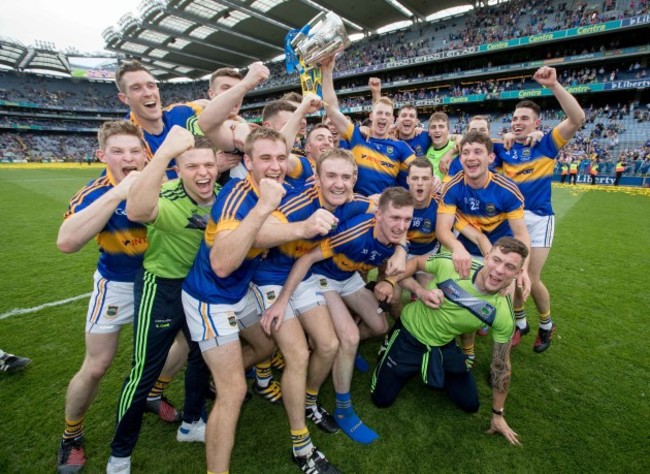 Tipperary players celebrate with the Liam McCarthy Cup