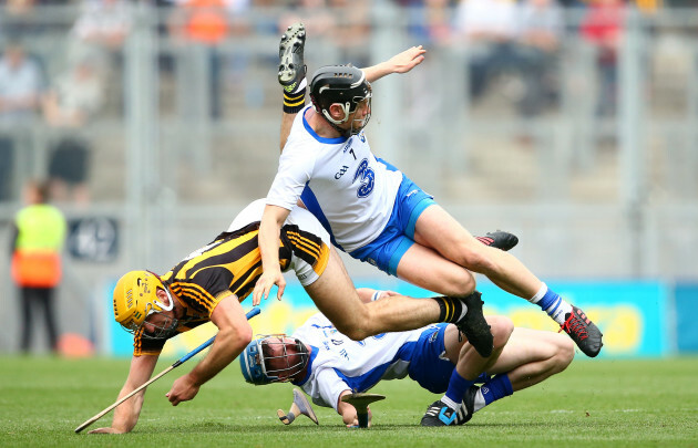 Colin Fennelly under pressure from Conor Gleeson and Philip Mahony