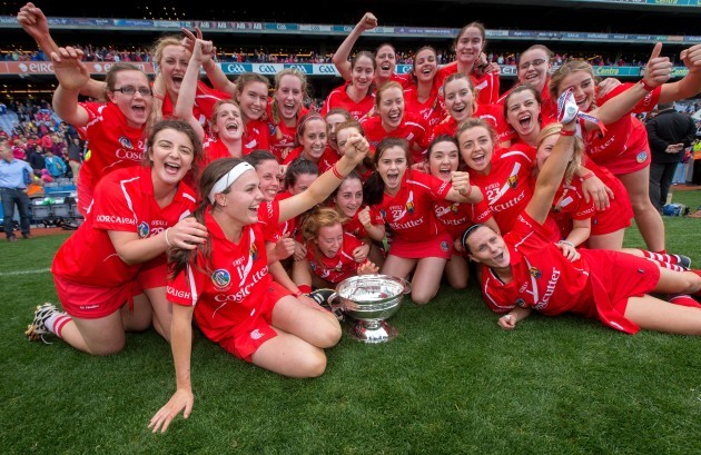 Cork celebrate with the O'Duffy Cup after the game