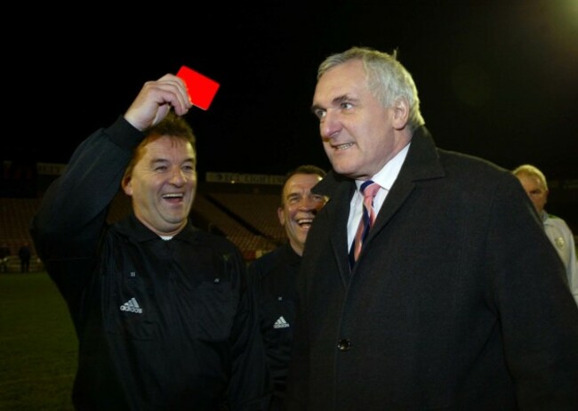 Pat Kelly issues a disgusted Bertie Ahern with a red card