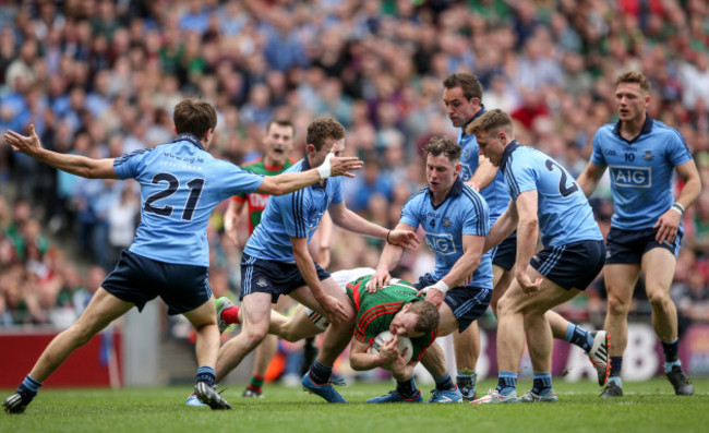 Michael Fitzsimons, Jack McCaffrey, Philly McMahon,Tomas Brady, John Small and Paul Flynn foul Colm Boyle resulting in a late penalty