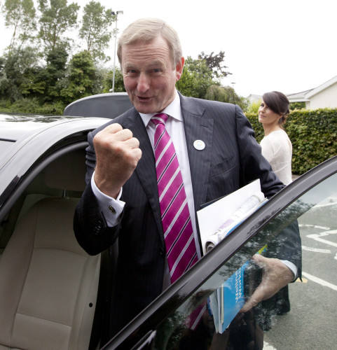13/9/2016. . Day 2 Fine Gael Think-In 2016. A defiant Taoiseach Enda Kenny, displays his newfound Mojo, as he gets into his car at the end of his meeting with his Parliamentary Party, at the Keadeen Hotel in Newbridge, Co Kildare, where the annual Fine Ga