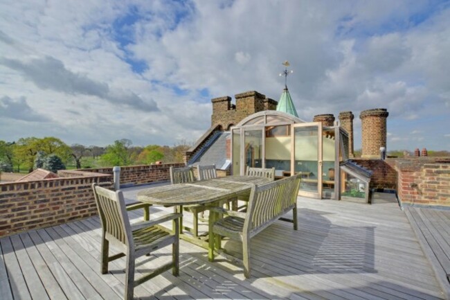 it-even-features-a-rooftop-terrace-and-kitchenette-to-bask-in-the-views-of-londons-skyline