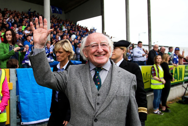 Michael D Higgins attends the game
