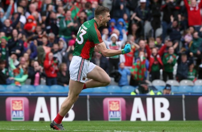 Conor O'Shea celebrates after scoring a goal