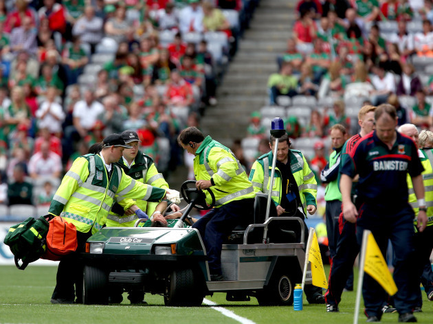Cian Hanley is taken off injured