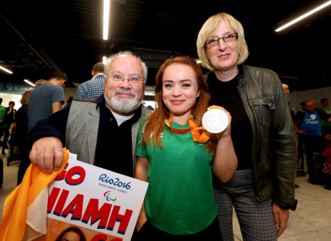 Niamh McCarthy with her parents Flor and Caroline McCarthy