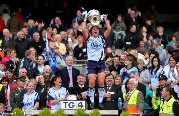 Lyndsey Peat does a jig with the trophy