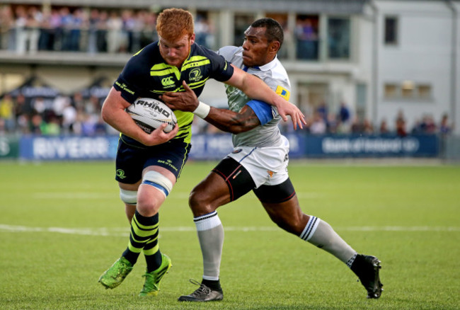 Semesa Rokoduguni tackles Peadar Timmins