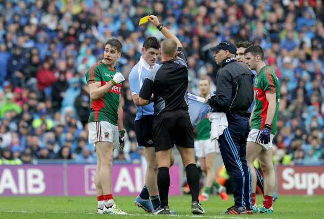 Dublin's Diarmuid Connolly and Lee Keegan of Mayo receive yellow cards