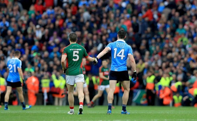 Lee Keegan and Diarmuid Connolly at the end of the game