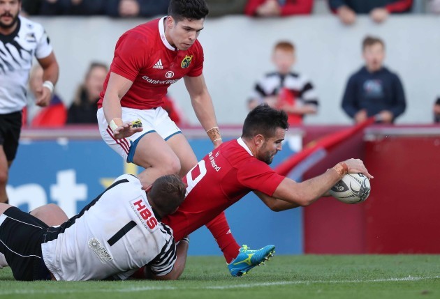 Munster’s Conor Murray scores a try