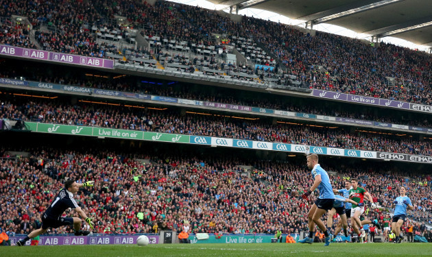 Lee Keegan scores the first goal of the game past goalkeeper Stephen Cluxton
