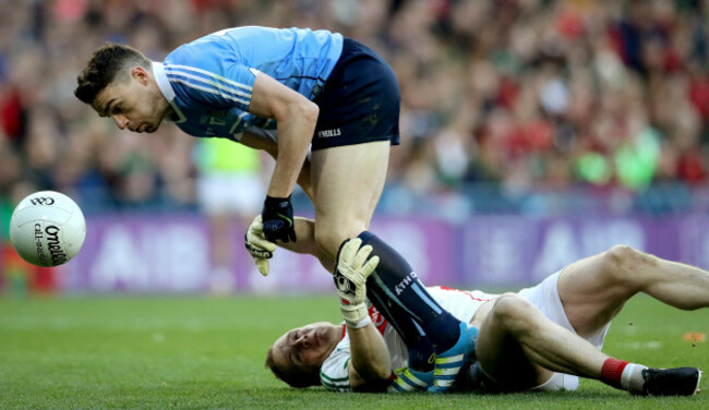 Robert Hennelly fouls Paddy Andrews to concede a penalty