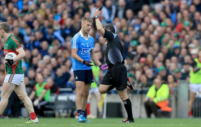 Jonny Cooper is black carded by referee Maurice