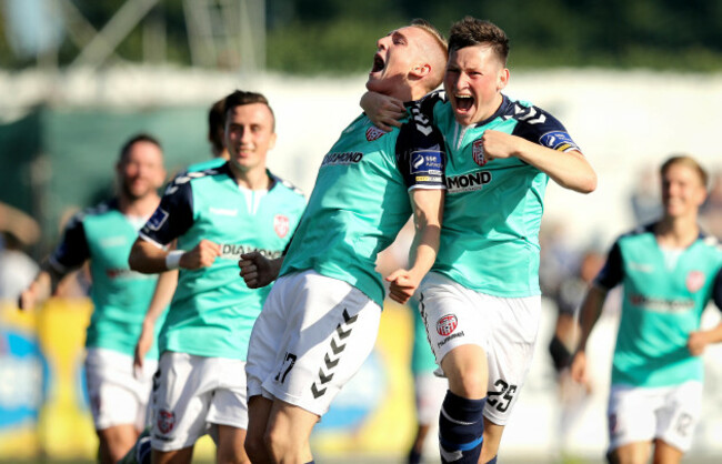 Ronan Cutis celebrates scoring their second goal of the game with Conor McDermott