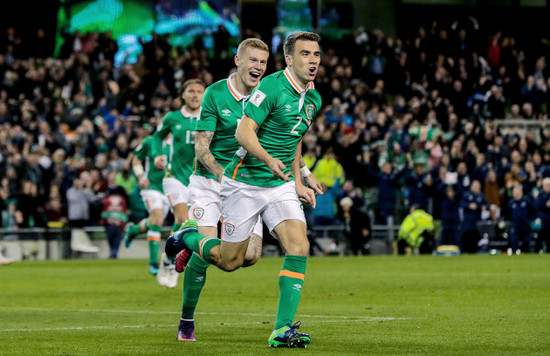 Seamus Coleman celebrates scoring a goal with James McClean