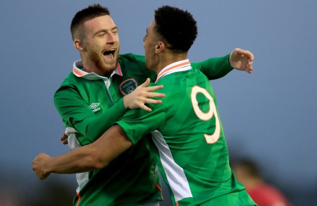 Courtney Duffus celebrates scoring the first goal of the game with Jack Byrne