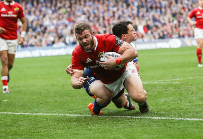 Munster&rsquo;s Jaco Taute scores a try as he is tackled by Leinster&rsquo;s Joey Carbery