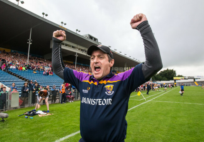 Liam Dunne celebrates at the final whistle