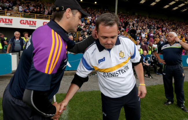 Davy Fitzgerald and Liam Dunne at the end of the game