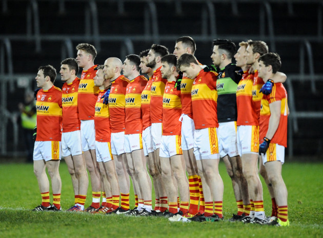 Castlebar Mitchels players stand for the national anthem