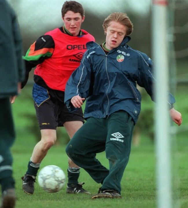 Damien Duff is challenged by Robbie Keane 9/2/1998