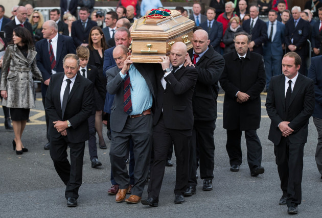 Mick Galway, Peter Clohessy, Keith Wood and John Hayes carry The coffin of Munster Rugby head coach Anthony Foley