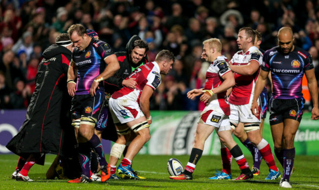Sean Reidy is congratulated by teammates after scoring a try
