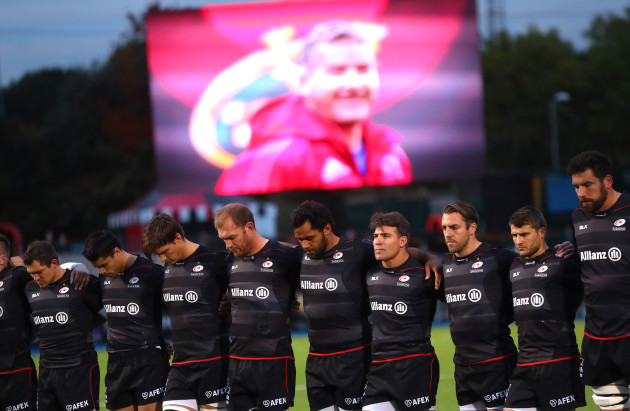 The Saracens team stand for a minutes silence
