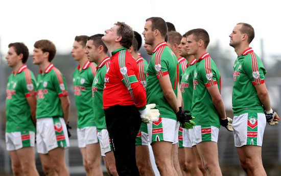 St. Brigids players stand for the National Anthem