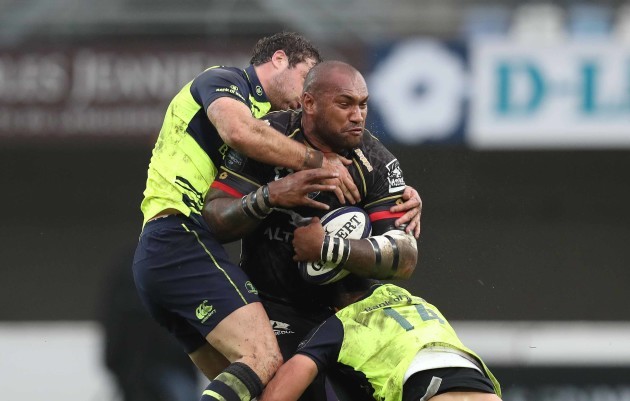 Montpellier’s Nemani Nadolo  is tackled by Leinster’s Garry Ringrose  and Zane Kirchner