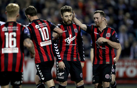 Mark Qugley with Kurtis Byrne and Patric kKavanagh after scoring