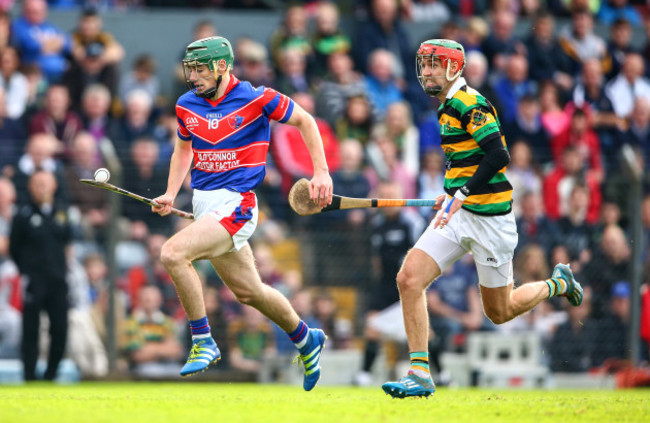 Robbie O'Flynn solos past Stephan McDonnell