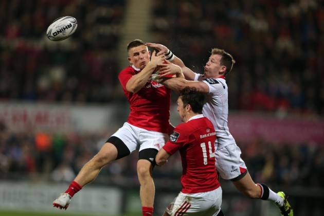Craig Gilroy wins the high ball against Andrew Conway and Darren Sweetnam