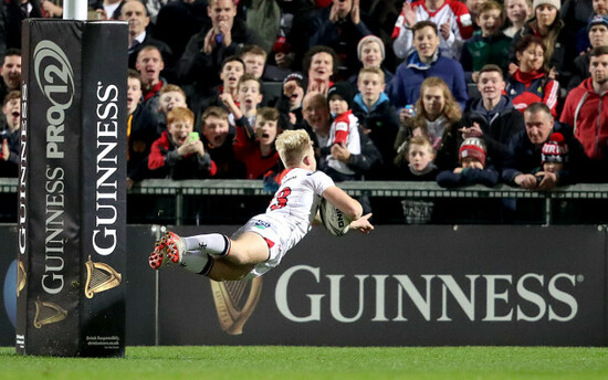 Rob Little dives over for a try