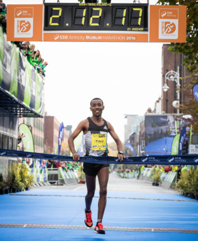 Dereje Debele Tulu from Ethiopia crosses the line to win the Dublin Marathon