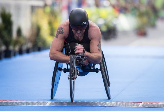 Patrick Monahan crosses the line to win the Wheelchair race during the Dublin Marathon