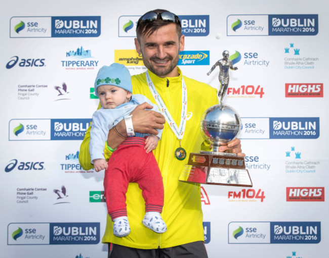Sergiu Ciobanu celebrates winning the Irish National Championship with his son Daniel