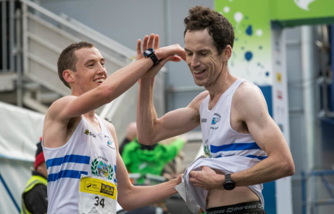 Competitors share a joke after finishing the Dublin Marathon