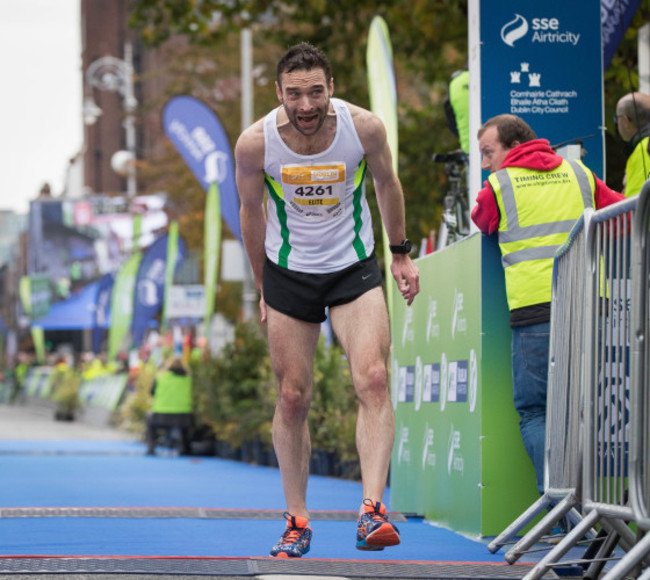 A competitor finishes the Dublin Marathon